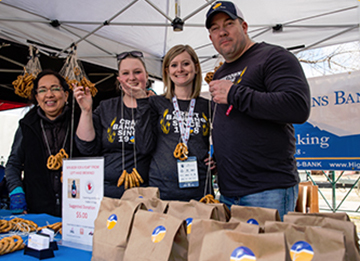 High Plains Bank team with pretzel necklaces