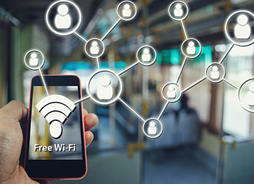Photo of free wifi, hand holding a phone and people icons