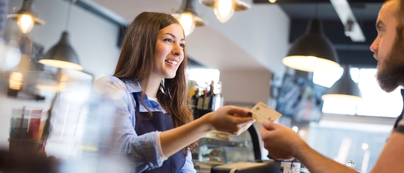 sales clerk receiving payment