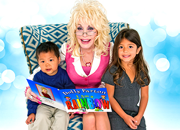 Dolly Parton with kids and book