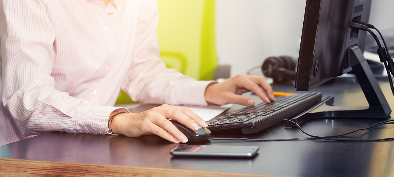 female hands on a keyboard