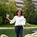 Photo of woman holding an American flag