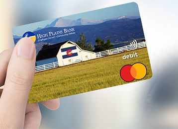 Hand holding HPB debit card