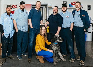 picture of AutoSport team and dog